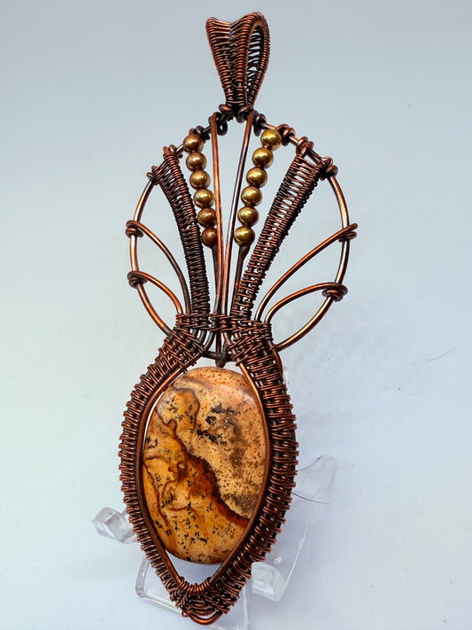 Pendente con pietra fossile